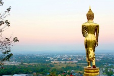 Golden Buddha Statue On A Mountain
