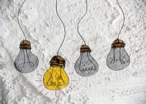 Idea Light Bulb Icon On Wall