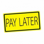 Pay later black stamp text on yellow