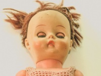 Portrait Of An Antique Female Doll
