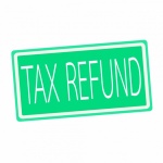 Tax refund white stamp text on green