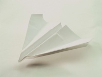White paper plane background