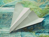 White paper plane background