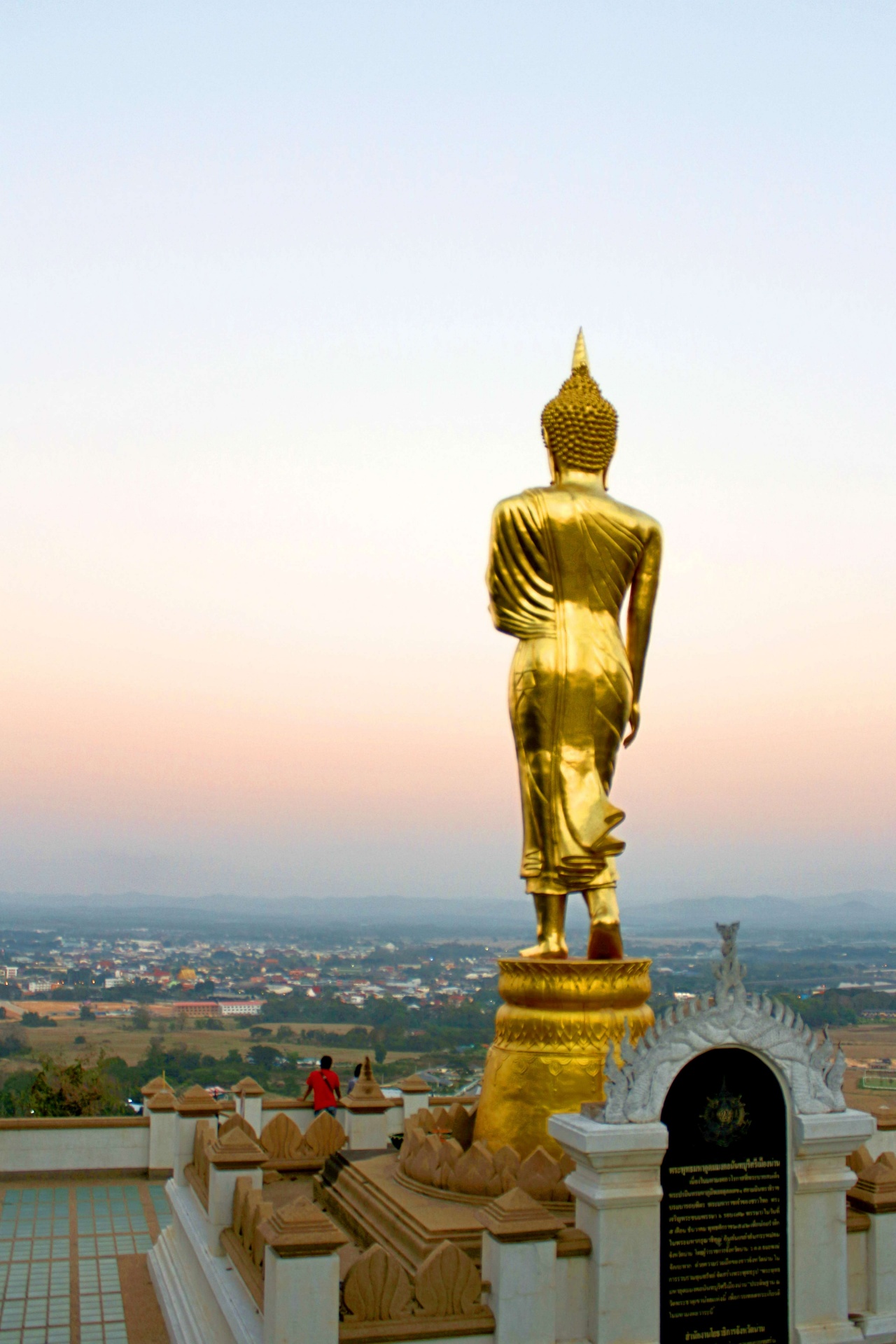 Golden Buddha Statue On A Mountain