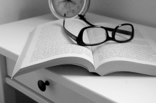 Glasses And Book At Nightstand
