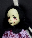 Bambola spaventosa di Halloween