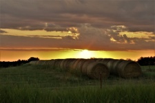 Sunset Over Hay Bales