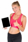 Fit Woman With A Tablet