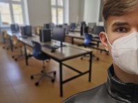 Student med mask