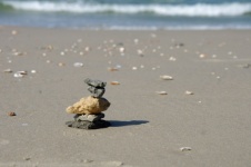 Stacked balanced rocks on beach
