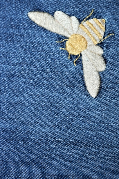 Bee On Blue Denim Background Free Stock Photo - Public Domain Pictures