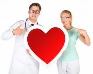 Doctors Holding A Heart