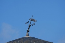 Weathervane Twisted By The Wind