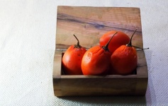Wooden Box With Tree Tomato Fruit