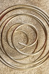 Spiral shaped round metal spring