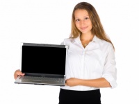 Woman Showing A Laptop Screen