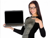 Woman showing a laptop screen