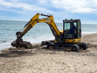 Excavator On The Beach