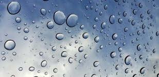 Raindrops And Sky Background