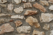 Textured Rocks In Stone Wall