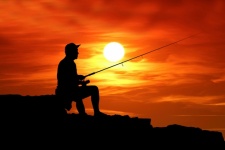 Fiskare solnedgång siluett