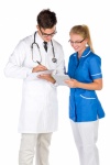 Doctor And A Nurse Taking Notes