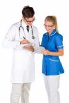 Doctor And A Nurse Taking Notes
