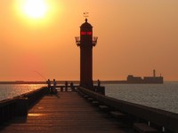 Lighthouse és napnyugta