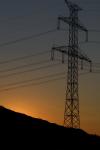 Transmission tower at sunset