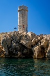 Lighthouse On A Rock