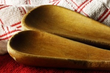 Wooden Spoons On A Dishcloth