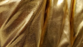 Fundal textil auriu