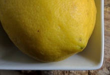 Ripe Yellow Lemon In A Square Bowl
