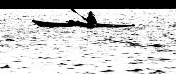 Man in kayak on water