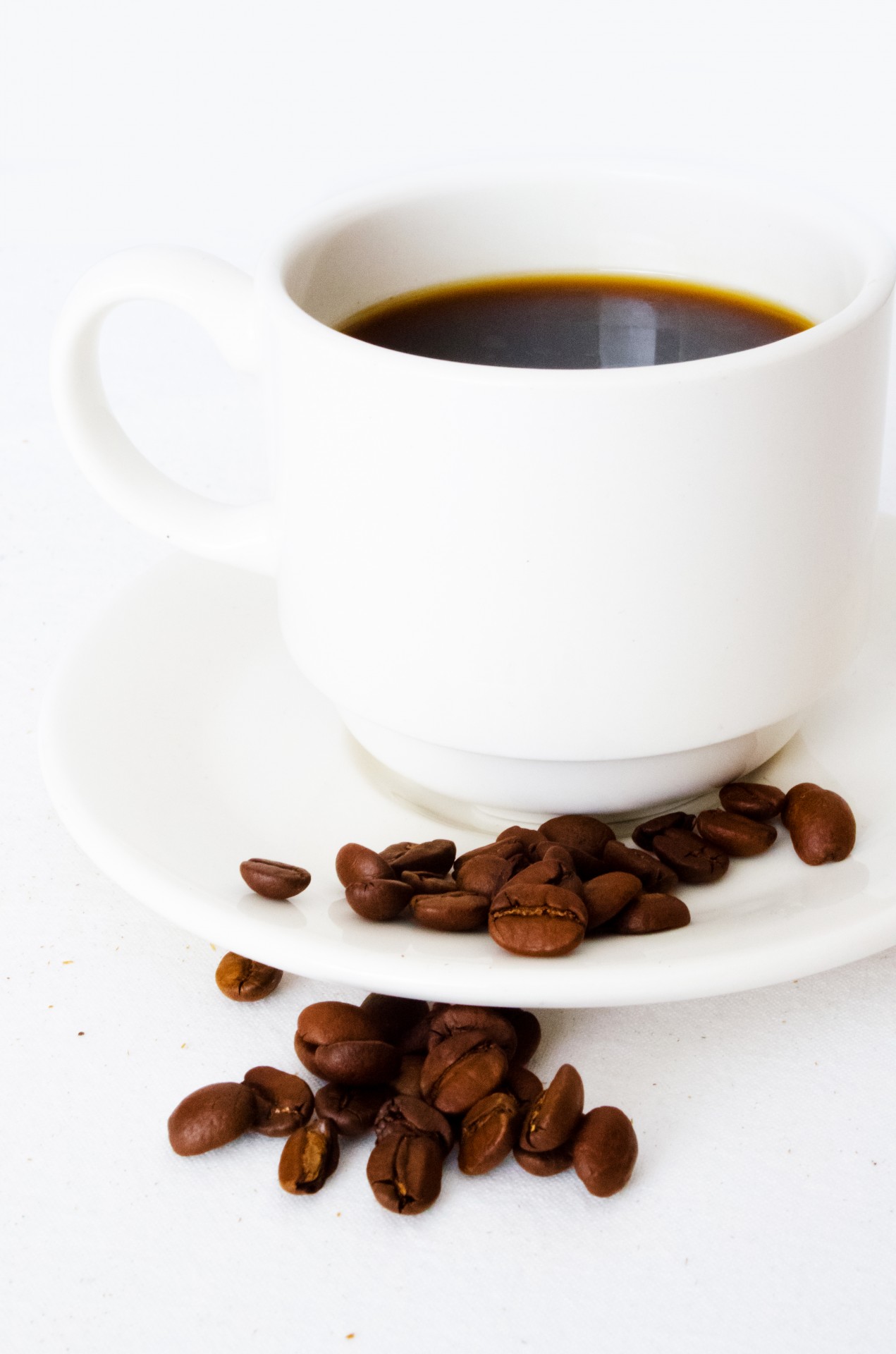 Kaffeetasse und Bohnen