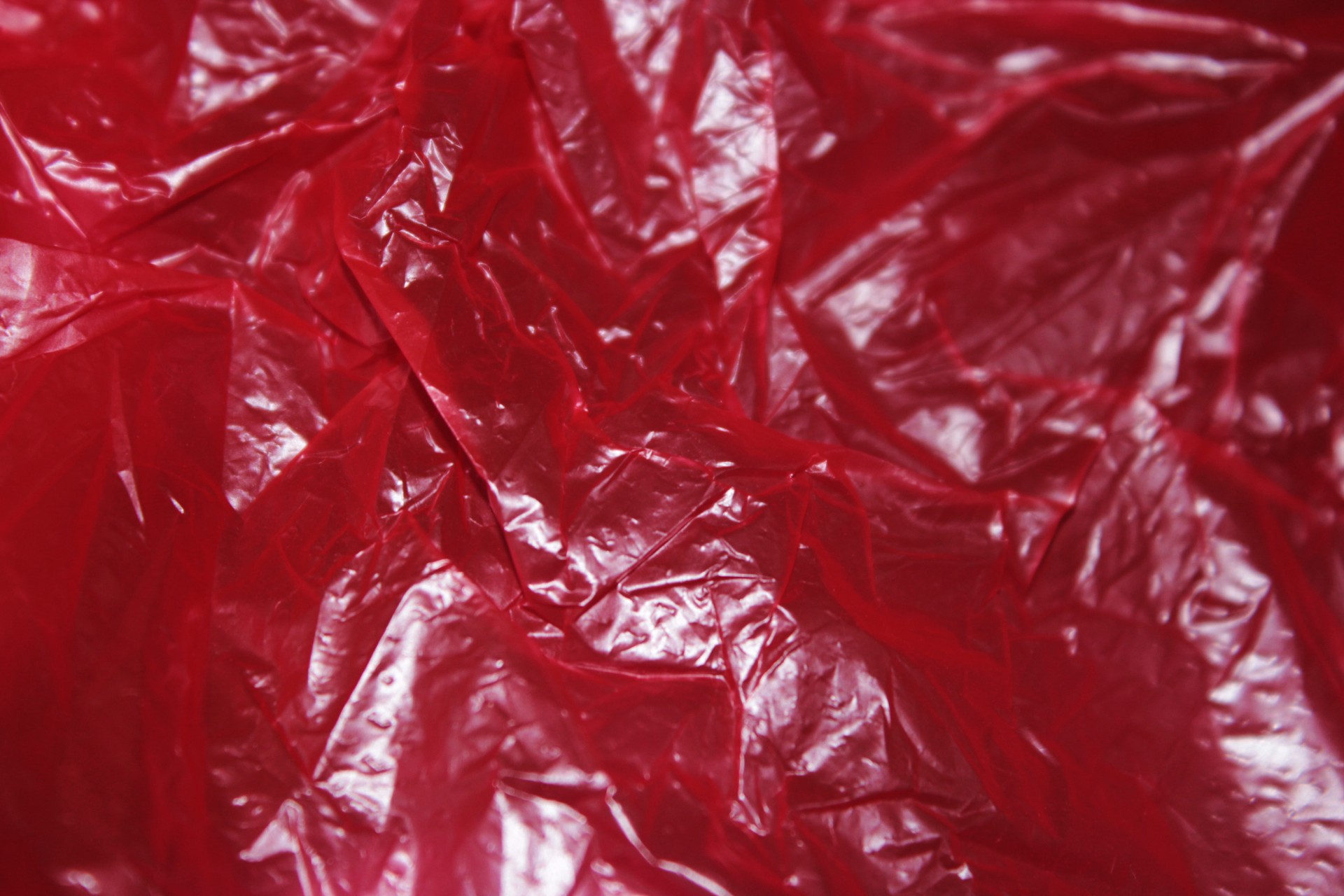 Красная пластиковая фоне