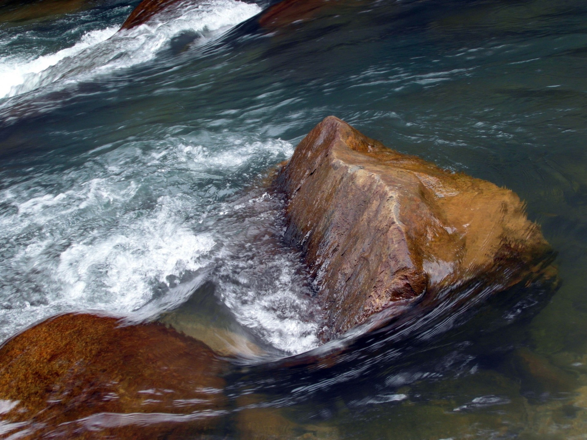 River Rapids Over Boulders