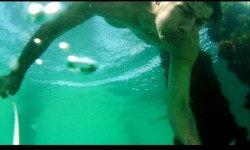 Underwater swimming man