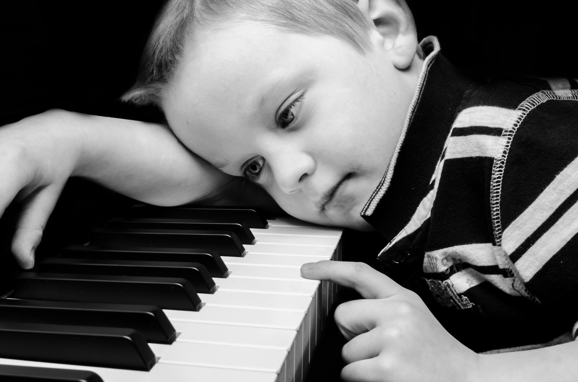 Sad Boy Plays Piano