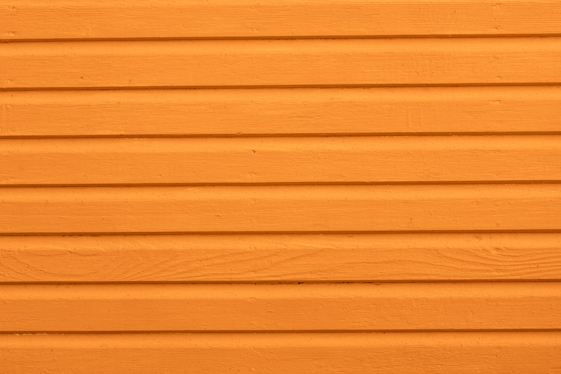 Древесина текстуры оранжевом фоне