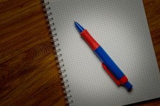 Niebieski długopis i notes z mocą