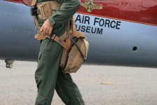 Pilot Strapping On Parachute