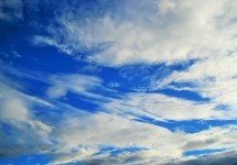 Streaky clouds in blue sky