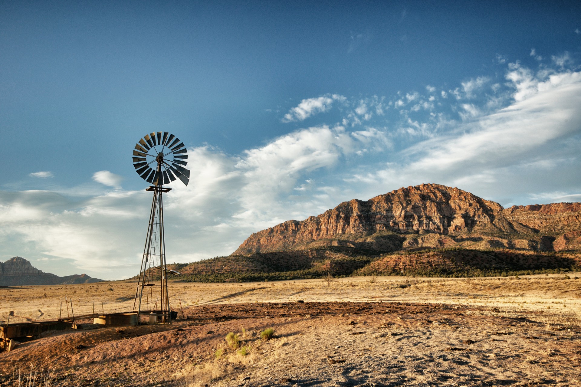 Windmill Over Desert Ranch